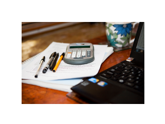 Picture of Calculator, pens and laptop on a desk - Paul provides accountancy services including general consultancy, system reviews, risk review, management accounts, Statutory Accounts Preparations Independent examinations, Preparation for audit and Taxation including VAT - Paul Cowham Accountancy - Manchester based accountant specialising in the charity and social enterprise sectors